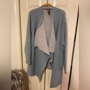 Light blue Marla Wynn’s sweater